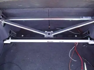 Professioneel Toyota Celica T23 00 + UltraRacing Veerpootbrug achter-boven